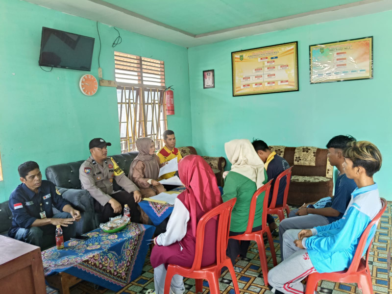 Bhabinkamtibmas Sungai Bela Hadiri Rapat DPSHP Pilkada Tahun 2024 Tingkat Desa Sungai Bela