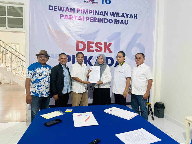 Paslon Bupati dan Wakil Bupati Inhil Haji Herman-Yuliantini Terima SK Dukungan Partai Perindo